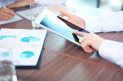 Person using a tablet in a conferance