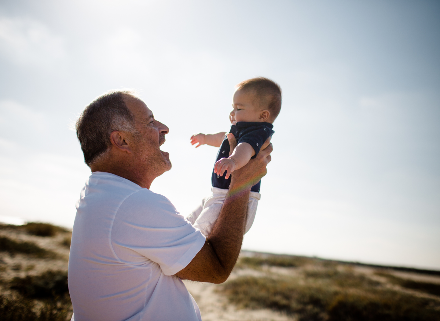 man holding an infant