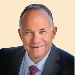 John P. Ulrich, CFP® - President & CEO