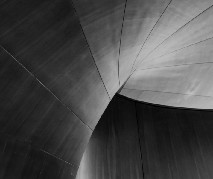 Grey-abstract-metallic-spiraling-structure