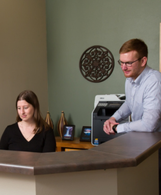 Chase working with co-worker