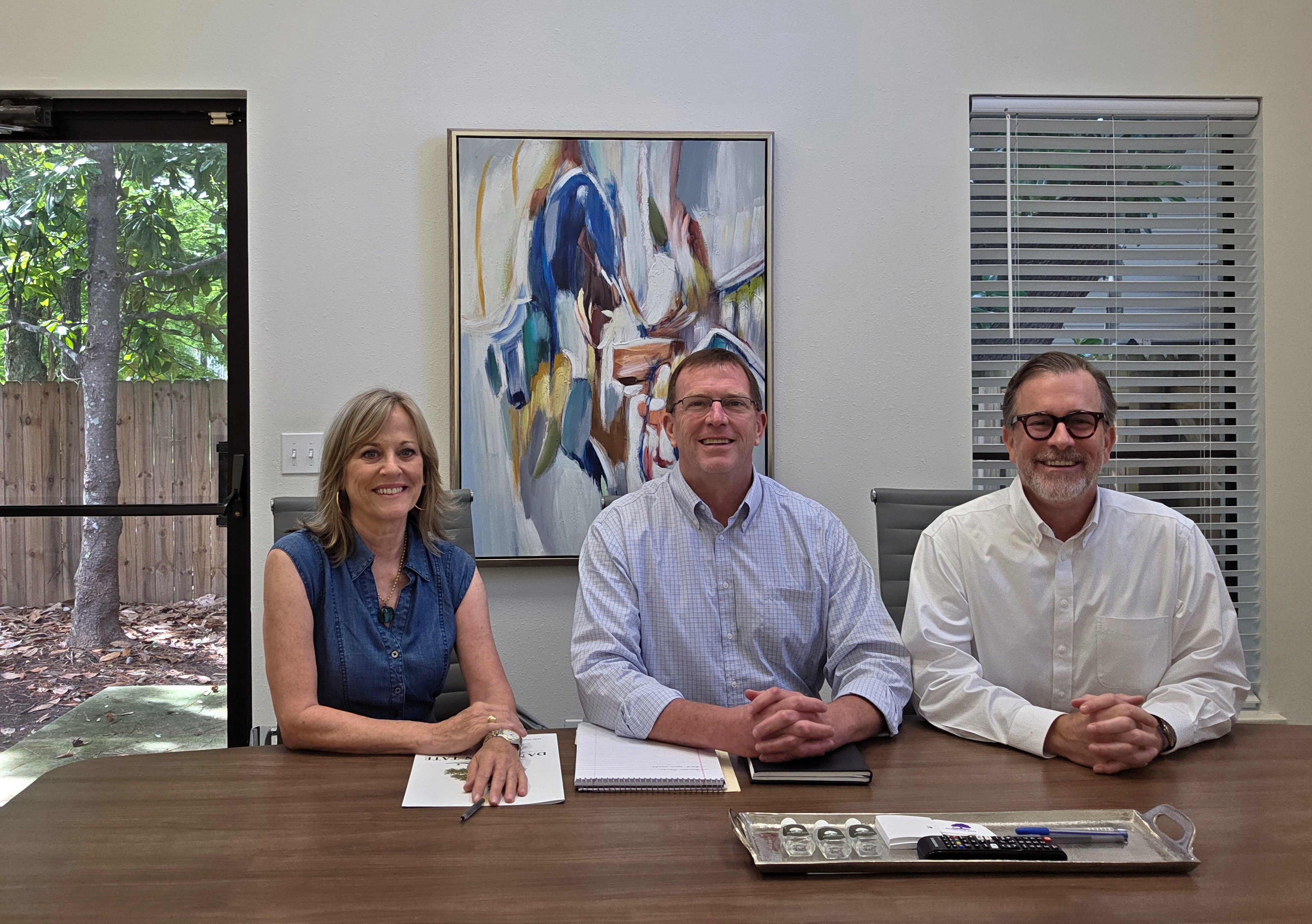A Unified, Three-Person Partnership