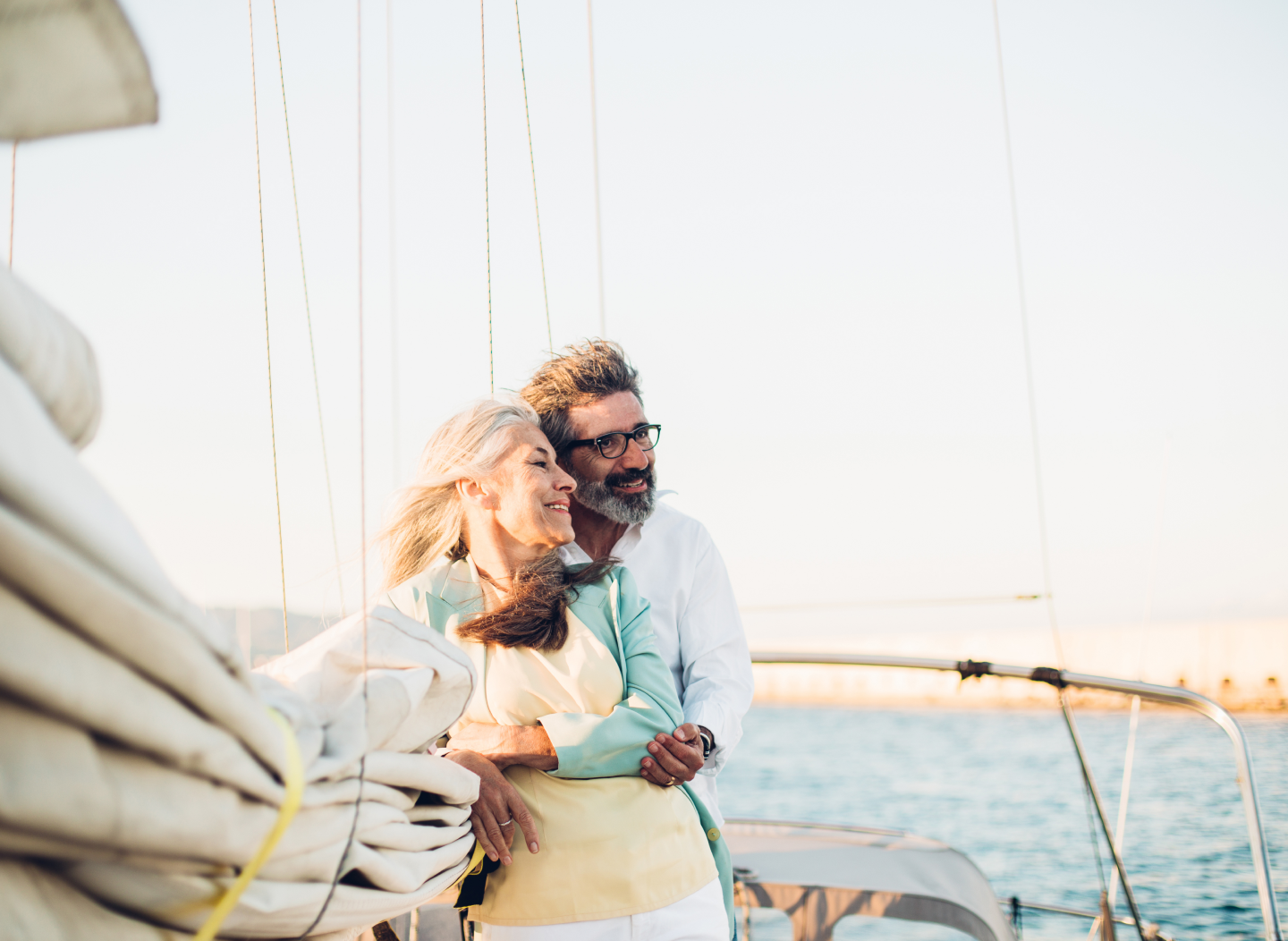 couple enjoying riding on a sailboat