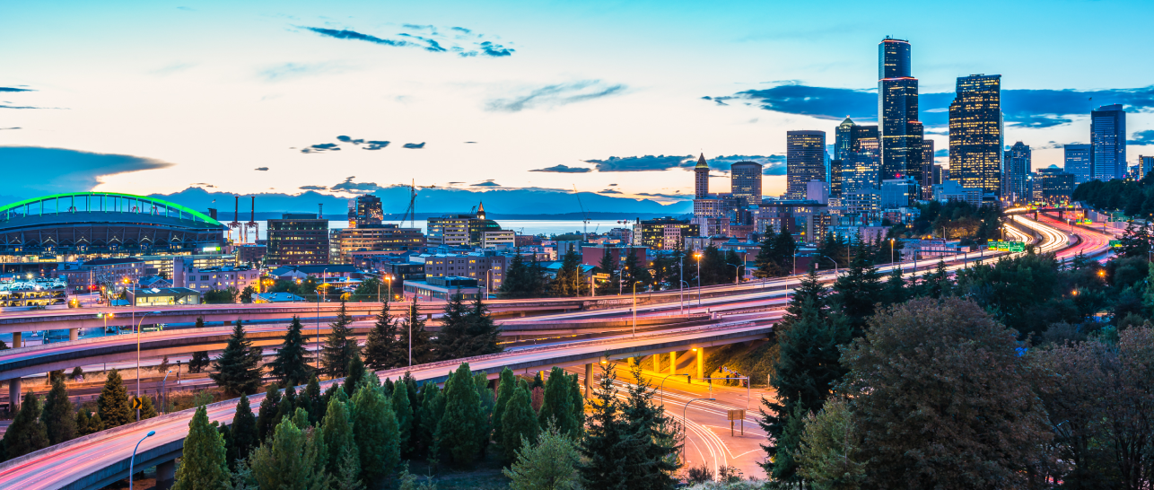 cityscape next to a highway