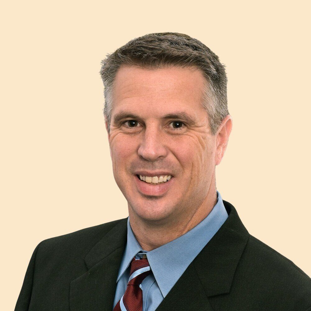 John P. Ulrich, CFP® - President & CEO