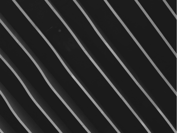 Abstract-art-of-flat-pieces-of-metal-running-parallel