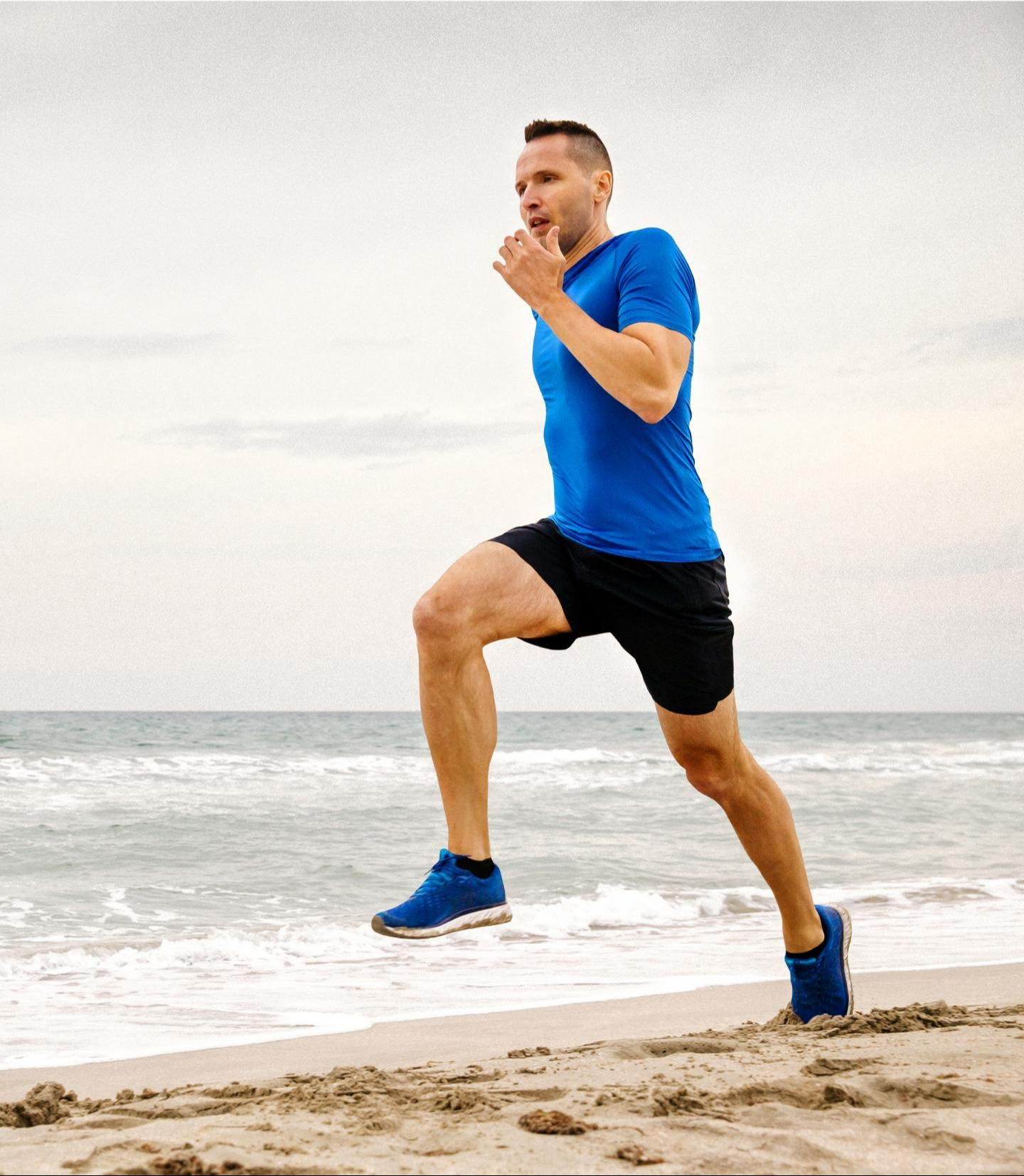 Man working out on beach