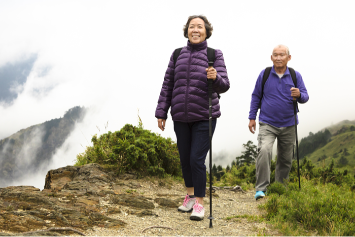 Couple Walking on Mountain Path
