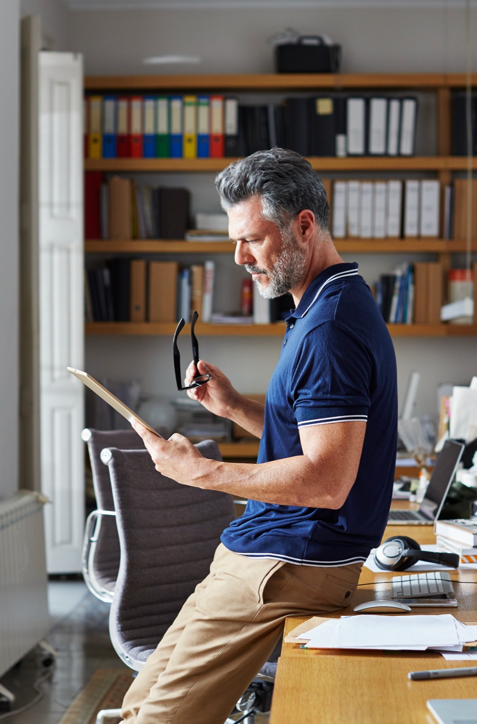 Business man checking data on IPad