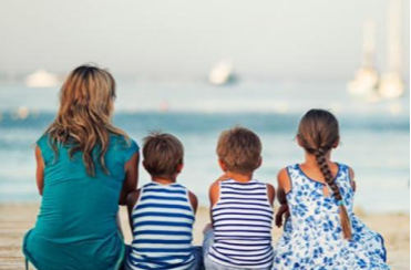 Woman-with-three-children