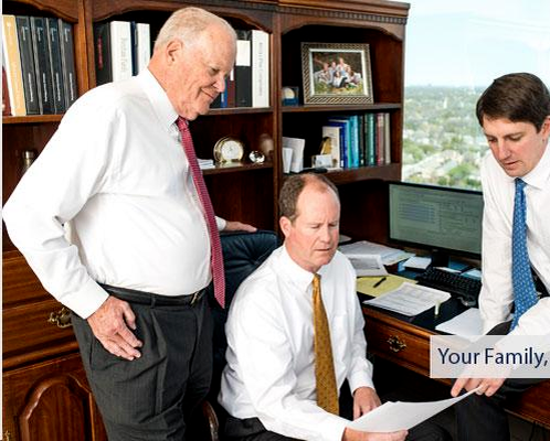 Ken and Jack Brown of the Brown Ruth Advisors team discussing contents of a paper