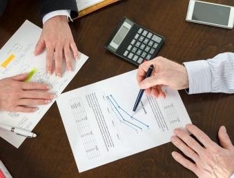 Reviewing charts during a meeting