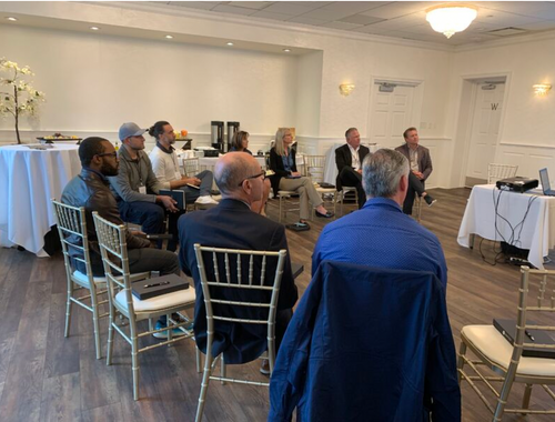 Guests listening to Brian Church and Dean Niewolny.