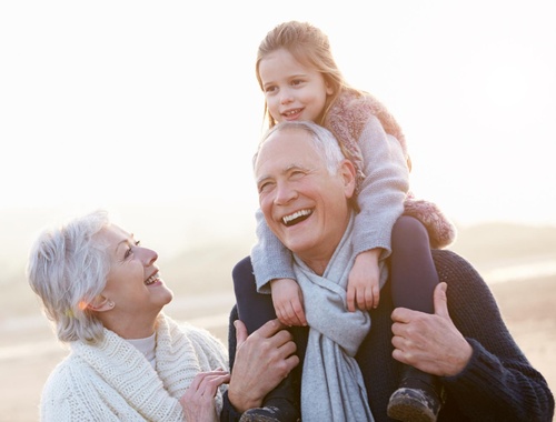 Elderly couple with grandchild