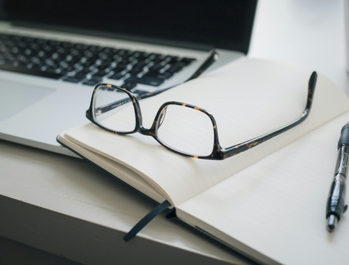 Glasses on Notebook