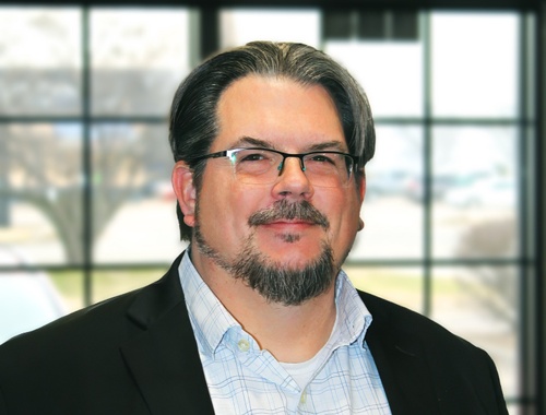 Michael Sharbutt, Director of Tax