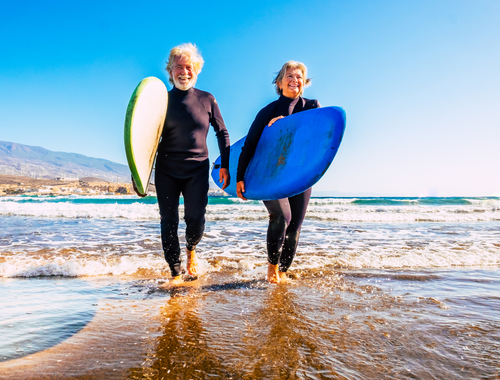a retired couple surfing