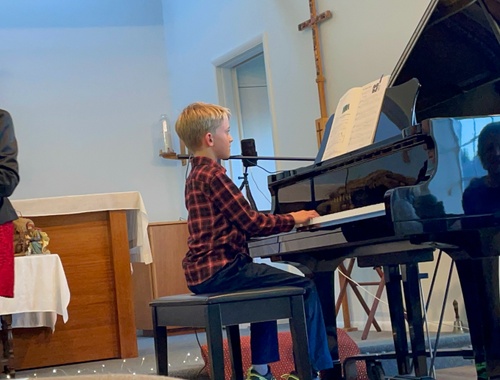 Our little guy playing his holiday recital