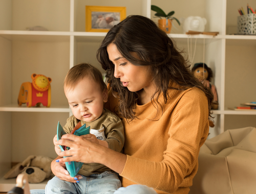 mother reading to her toddler