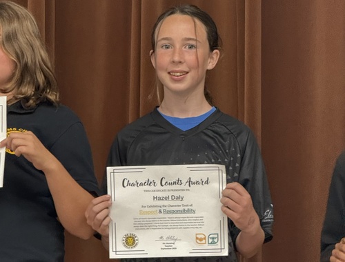 Celebrating Emily's older daughters amazing character award - what an achievement!