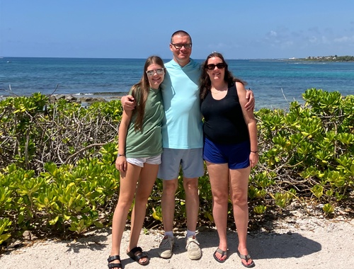 Shelley Bowen with her family by the ocean