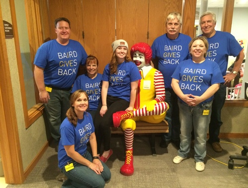  Baird Associates and their families brought and served dinner to families residing at the Ronald McDonald House in Milwaukee.