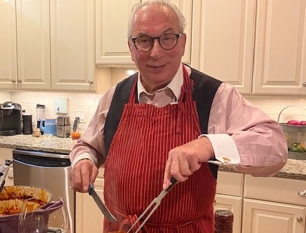 Jim cooking his favorite Braciole for guests.