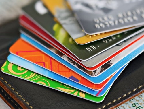 A Tale of Two Borrowers: What Credit-Card Tightening Reveals About the Economy