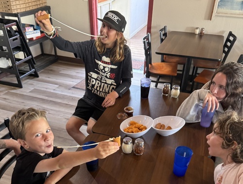 Pizza time with Emily's family