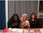 Volunteers At Gift Voucher Desk