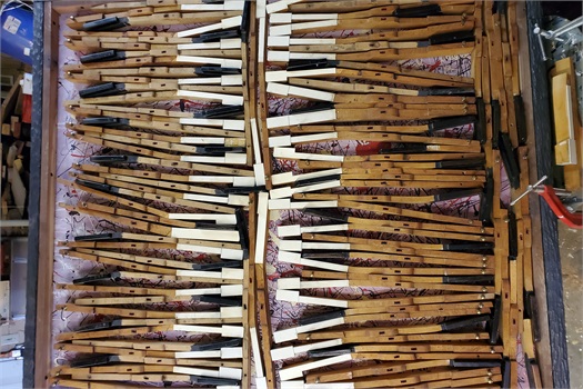 This piece is titled "Harmony Tattoo", and is a part of the 61st Midwestern Art Show in the Rourke Art Museum.