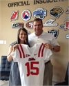CFSs Kevin and Kelly receive a jersey from Ross Bjork